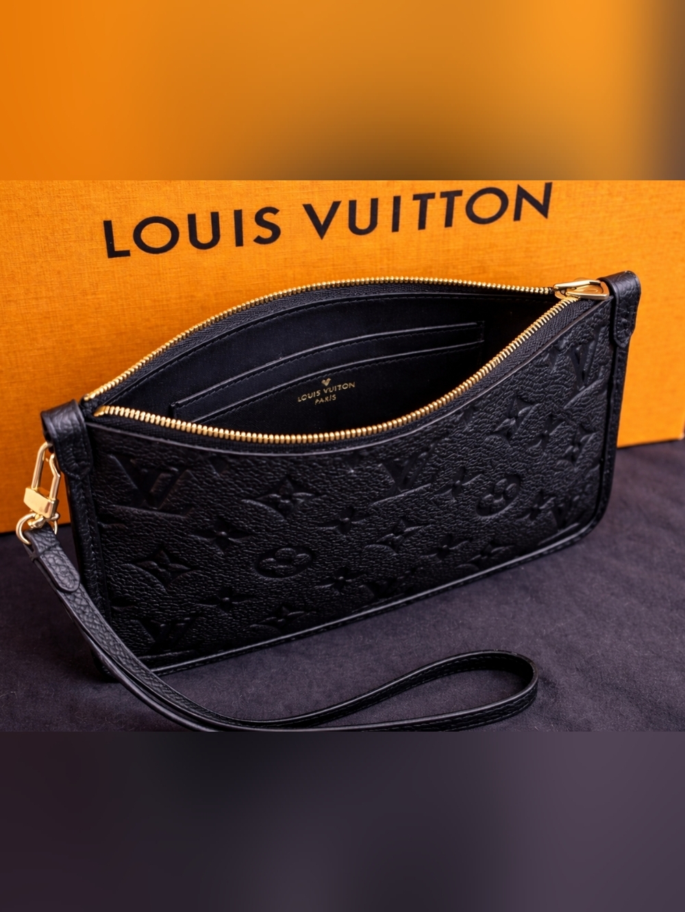 Louis Vuitton Black Monogram Embossed Leather Wristlet - Picture 3 of 3